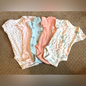 A BUNDLE of FIVE Newborn Onesies
